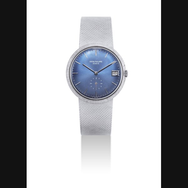 PATEK PHILIPPE. AN 18K WHITE GOLD AUTOMATIC BRACELET WATCH WITH DATE SIGNED PATEK PHILIPPE, GENEVE, REF. 3445, MOVEMENT NO. 1'231'401, CASE NO. 329'506, MANUFACTURED IN 1971