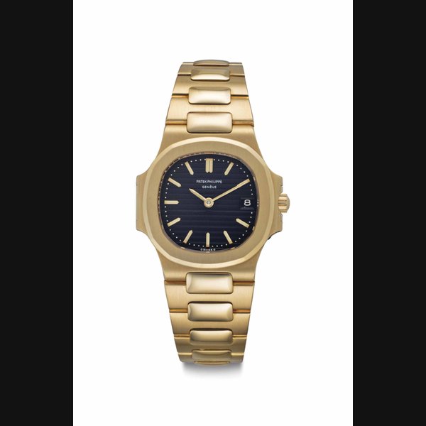 Patek Philippe. A Lady's Fine 18k Gold Quartz Wristwatch with Date and Bracelet Signed Patek Philippe, Geneve, Ref. 4700/1, Movement No. 1'527'411, Case No. 2'818'308, Manufactured in 1983