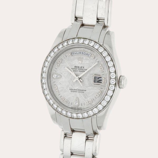 Rolex Day-Date Pearlmaster, Reference 18946 | A platinum and diamond-set wristwatch with day, date, bracelet and meteorite diamond-set dial | Circa 2005 · 18946