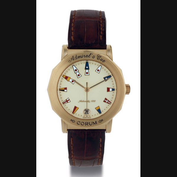 CORUM. A LIMITED EDITION 18K GOLD DODECAHEDRAL AUTOMATIC WRISTWATCH WITH CENTER SECONDS AND DATE SIGNED CORUM, ADMIRAL'S CUP, AUTOMATIC 100, NO. 6/100, CASE NO. 596886, REF. 294.430.56, CIRCA 1998