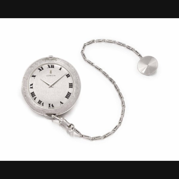 Corum. A fine 18K white gold openface keyless lever dress watch with chain Signed Corum, movement no. 38'855, case no. 5522-17, circa 1970