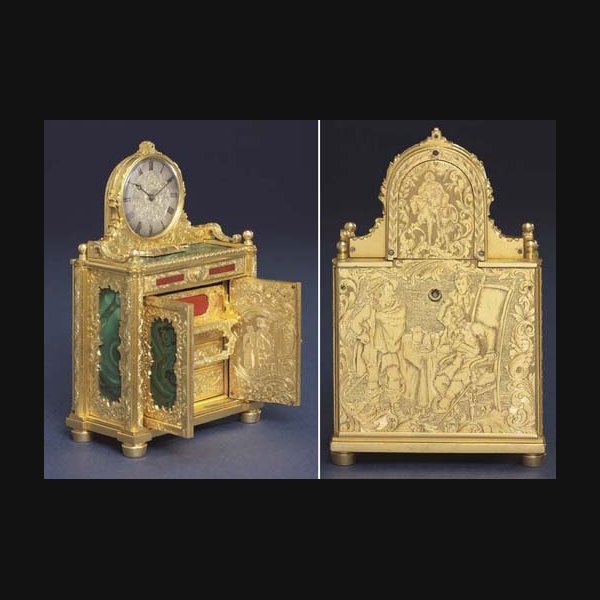 A Victorian Engraved Gilt-Brass A Victorian engraved gilt-brass, malachite and bloodstone mounted miniature chiffonier timepiece THOMAS COLE. CIRCA 1854