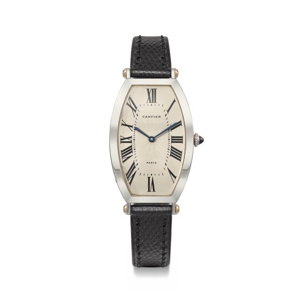 CARTIER. A RARE AND ATTRACTIVE TONNEAU-SHAPED PLATINUM WRISTWATCH SIGNED CARTIER, TONNEAU COLLECTION PRIVEE MODEL, REF. W1546351, CIRCA 1990