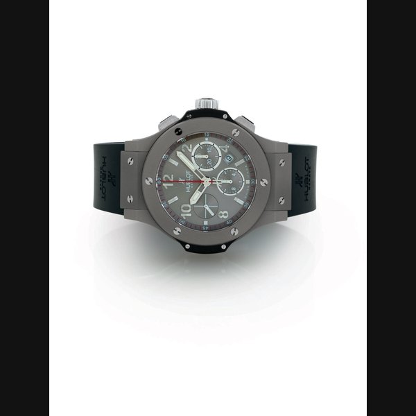 HUBLOT. A LIMITED EDITION OVERSIZED HUBLONIUM, TITANIUM, KEVLAR AND RUBBER AUTOMATIC CHRONOGRAPH WRISTWATCH WITH DATE SIGNED HUBLOT, BIG BANG, MAG BANG MODEL, NO. 119/250, CASE NOS. 301 AND 678545, CIRCA 2008
