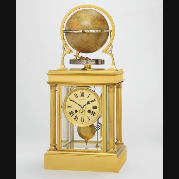 An ormolu four-glass striking eight day terrestrial globe clock with annual calendar JOHN WANAMAKER, PHILADELPHIA, NEW YORK AND PARIS, THE MOVEMENT BY C.H. HOUR, PARIS, THE GLOBE BY MAISON DELAMARCHE, PARIS. CIRCA 1890