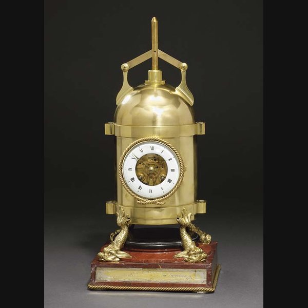 Ship'S Boiler A French Brass Ship's Boiler A French brass, red and black marble eight day striking novelty mantel clock VINCENTI. CIRCA 1900
