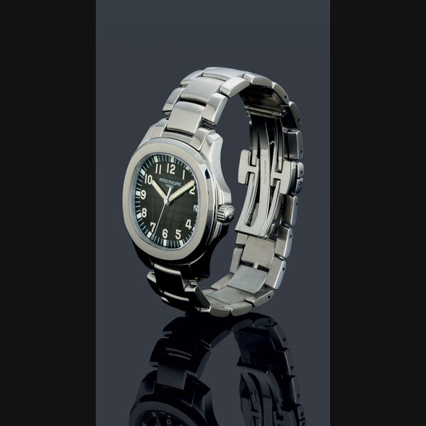 PATEK PHILIPPE. A STAINLESS STEEL AUTOMATIC WRISTWATCH WITH DATE, CENTER SECONDS AND BRACELET SIGNED PATEK PHILIPPE, GENEVE, AQUANAUT, MOVEMENT NO. 3905400, CASE NO. 4702700, REF. 5167/1A, CIRCA 2008