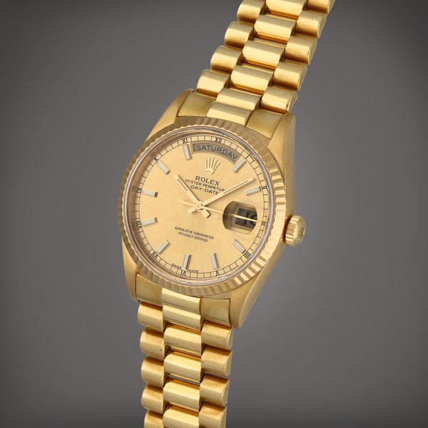 Rolex Day-Date, Reference 18238 | A yellow gold wristwatch with day, date and bracelet | Circa 1993 · 18238