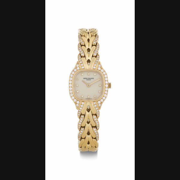 Patek Philippe. A Lady's 18k Gold and Diamond-Set Bracelet Watch SIGNED PATEK PHILIPPE, GENÈVE, REF. 4715/3, LA FLAMME MODEL, MOVEMENT NO. 1'601'598, CASE NO. 2'872'220, MANUFACTURED IN 1989