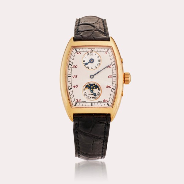 Franck Muller Reference 7500 DS L Master of Complications | A yellow gold tonneau jump hour wristwatch with date, regulator dial, and moon-phases, circa 2000