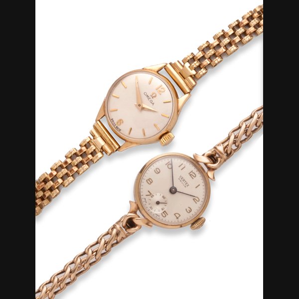 Omega Three wristwatches and a cased dress set(4)