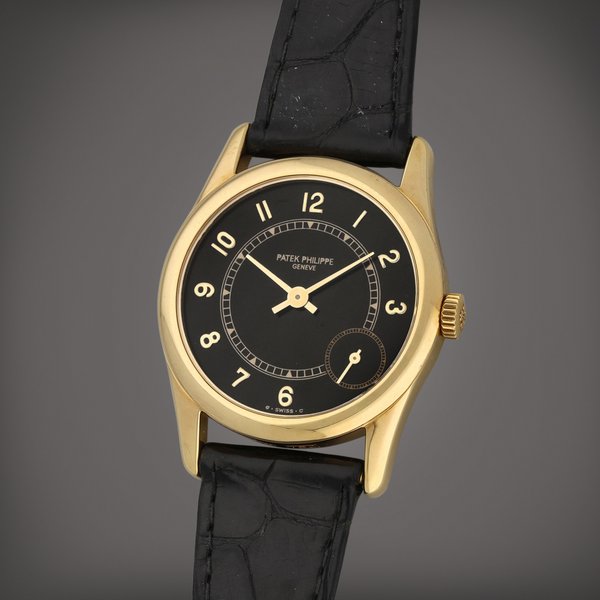 Patek Philippe Reference 5000 | A yellow gold wristwatch | Circa 1996