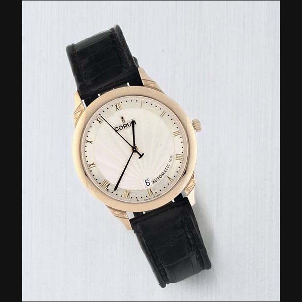 Corum. An 18ct Gold Water Resistant Automatic Centre Seconds Wristwatch with Calendar SIGNED CORUM AUTOMATIC 100 , REF NO 294.101.56 CASE NO 538066, CIRCA 2000
