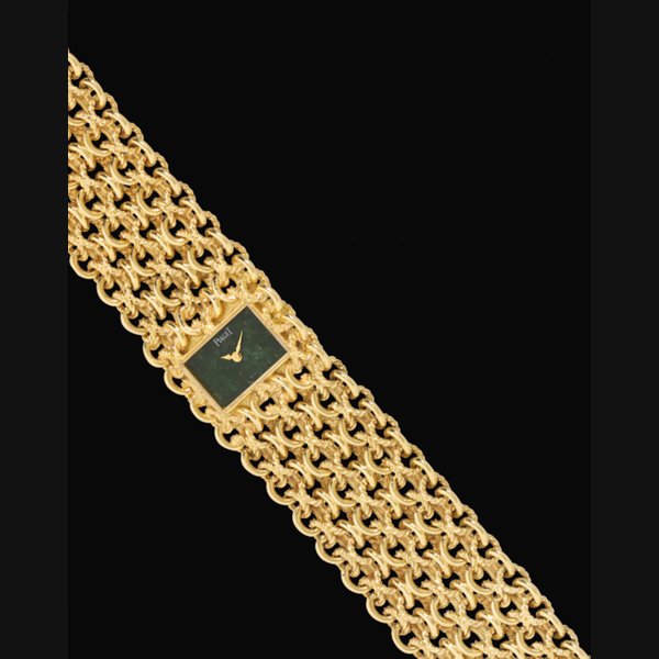 Piaget. A Lady's 18k Gold and Jadeite Bracelet Watch SIGNED, PIAGET, CASE NOS. 3891N58 AND 214080, MANUFACTURED IN 1972