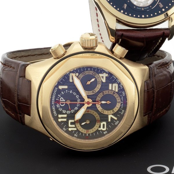 Girard-Perregaux Girard-Perregaux. An 18K gold automatic calendar chronograph wristwatch Laureato Evo 3, Ref:80180, No.N.143, Sold 6th January 2006 · 80180