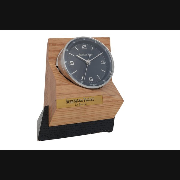 Audemars Piguet Code 11.59  Stainless steel alarm desk clock with wooden stand  Circa 2019