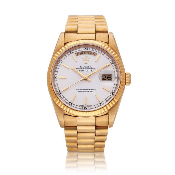 Rolex Reference 18238 Day-Date | A yellow gold wristwatch with day, date and bracelet, Circa 1991 · 18238