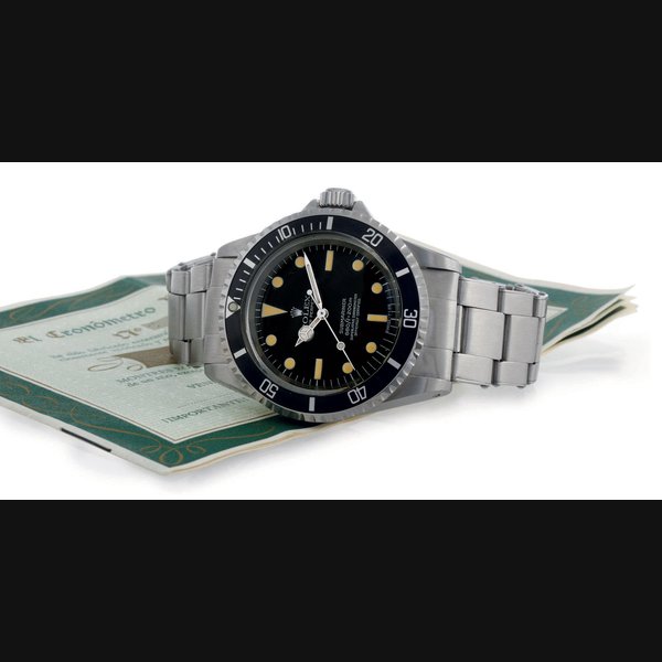 ROLEX. A STAINLESS STEEL AUTOMATIC WRISTWATCH WITH CENTER SECONDS AND BRACELET SIGNED ROLEX, OYSTER PERPETUAL, SUBMARINER, 660FT=200M, MOVEMENT NO. D95308, CASE NO. 1206657, REF. 5512, CIRCA 1958