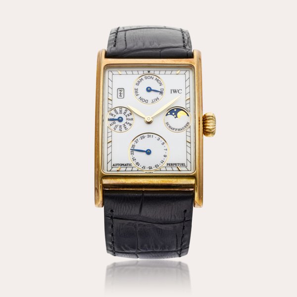 IWC Reference 3545 Novecento | A yellow gold rectangular automatic perpetual calendar wristwatch with moon phases and year indication, Circa 1990