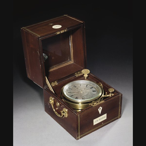  A Victorian brass and ebony-strung mahogany eight day marine chronometer RETAILED BY J.B.MAYO, CHICAGO, NO.2831; THE MOVEMENT BY THOMAS MERCER, LONDON, NO.2831. CIRCA 1876