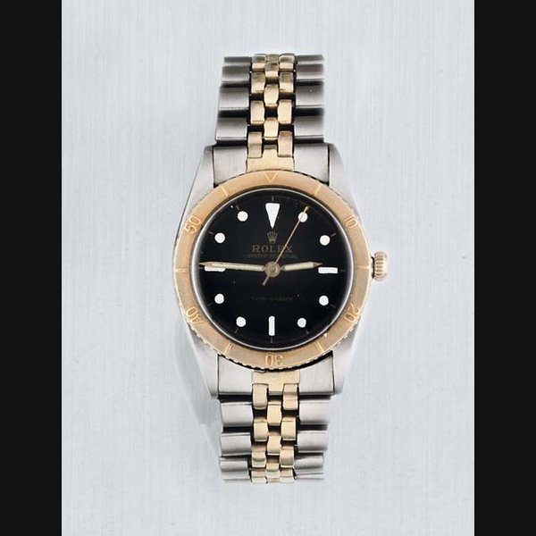 Rolex Rolex. A stainless steel and Gold Automatic Centre Seconds Water Resistant Wristwatch on Bracelet SIGNED ROLEX OYSTER PERPETUAL, MODEL TURN-O-GRAPH, REF.NO 6202, CASE NO 953839, CIRCA 1953