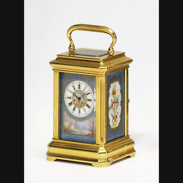 A French miniature gilt-brass and four panel porcelain-mounted eight day timepiece carriage clock NO. 3470. CIRCA 1870