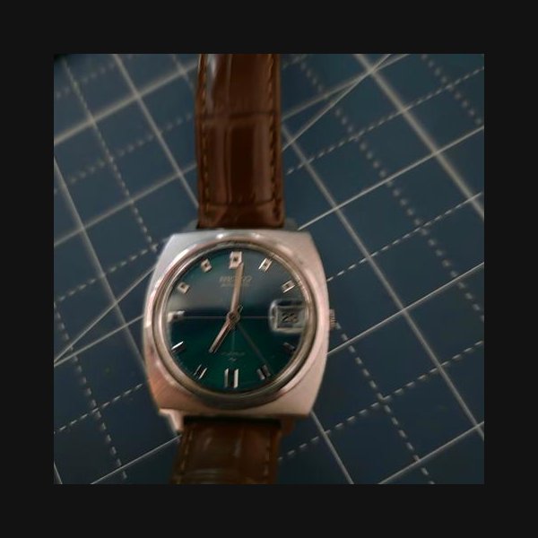 Seiko7005-7000 emerald sunburst dial