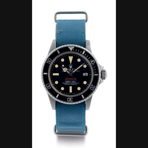 Rolex ROLEX. A FINE AND RARE STAINLESS STEEL AUTOMATIC WRISTWATCH WITH DATE, AND BRACELET SIGNED ROLEX, OYSTER PERPETUAL DATE, SEA-DWELLER, SUBMARINER 2000, 2000FT=610M, SUPERLATIVE CHRONOMETER OFFICIALLY CERTIFIED, CASE NO. 5057422, REF. 1665, CIRCA 1977, Price & Market Data