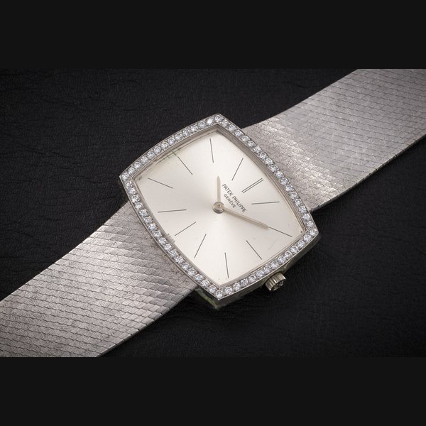 PATEK PHILIPPE, REF. 3528 2, A GOLD AND DIAMOND-SET WRISTWATCH CASE NUMBER: 2’671’394, MOVEMENT NUMBER: 1’160’205