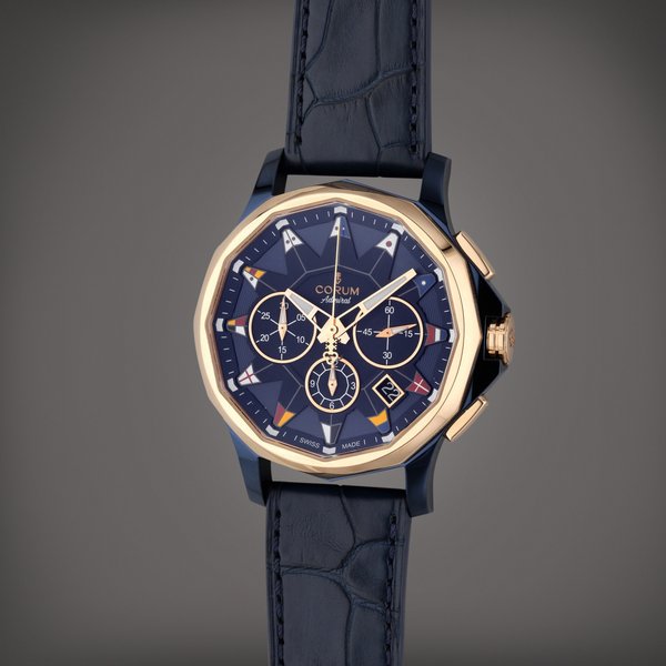 Corum Reference 01.0096 Admiral | A blue coated stainless steel and pink gold automatic chronograph wristwatch with date, Circa 2018