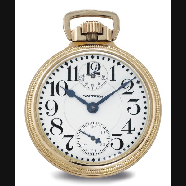 WALTHAM. A 10K GOLD-FILLED OPENFACE KEYLESS LEVER POCKET WATCH WITH UP-AND-DOWN SIGNED A.W.W.CO., WALTHAM, MASS., RIVERSIDE MAXIMUS, MODEL 1908, MOVEMENT NO. 23100038, CIRCA 1920