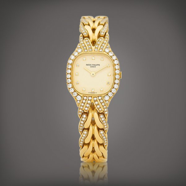 Patek Philippe La Flamme, Reference 4815 | A yellow gold and diamond-set bracelet watch, Circa 1990 | 百達翡麗 | La Flamme 型號4815 | 黃金鑲鑽石鏈帶腕錶，約1990年製 · 4815
