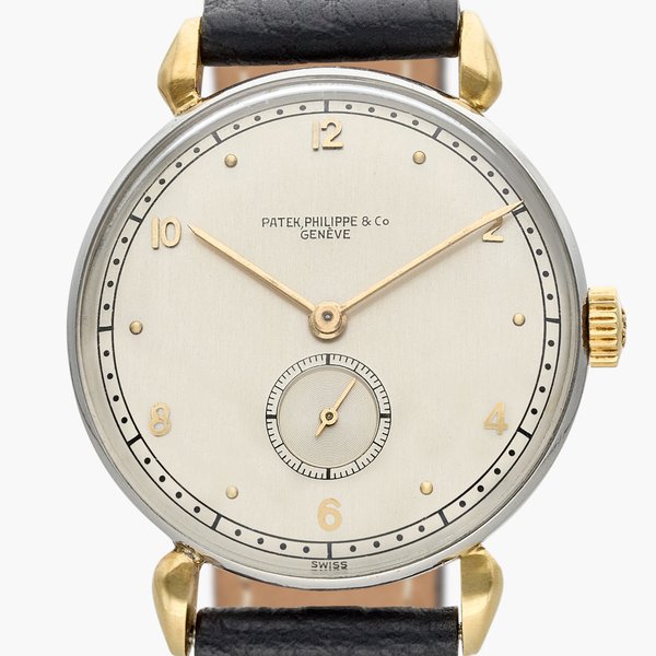 Patek Philippe Reference 1461 Calatrava | A stainless steel and yellow gold wristwatch, Circa 1942