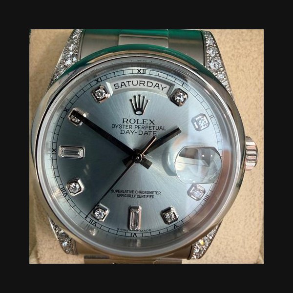 Rolex Day-Date36mm platinum diamonds ice dial diamond lugs mint factory diamond and on lugs very good 1link Ref. 118296