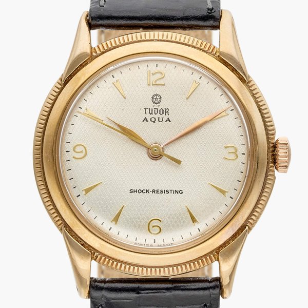 Tudor Aqua | A pink gold wristwatch with honeycomb dial, Circa 1950, Price & Market Data